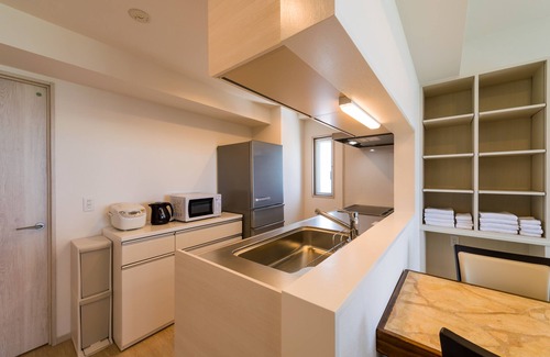 Chatan Condo | Perfect Oceanfront Retreat at MINATO Chatan Condominium