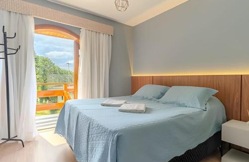 Alto do Capivari House | Relax at MineirINN: Pool, Spa & Mountain Views Await