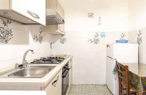 Seccheto Apartment | Sea View Minerva Apartment Steps from Seccheto Beach