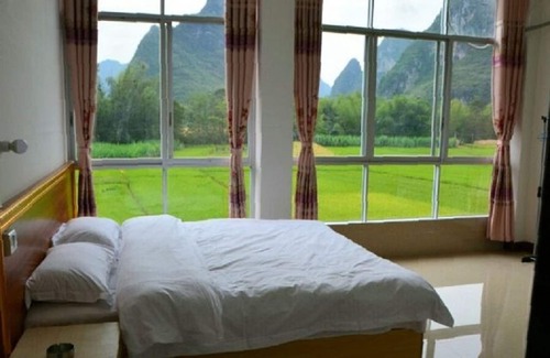 Chongzuo Hotel | Eco-Friendly MingShi Red Bean Restaurant HomeStay Awaits