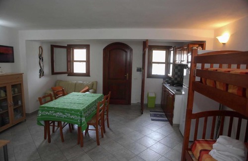 Calasetta Apartment | Cozy Mini Appartamento in Calasetta, Perfect for Families