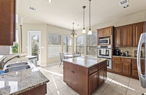 Travis Landing House | Impressive Mini Mansion with Games, Theater & Marina Access