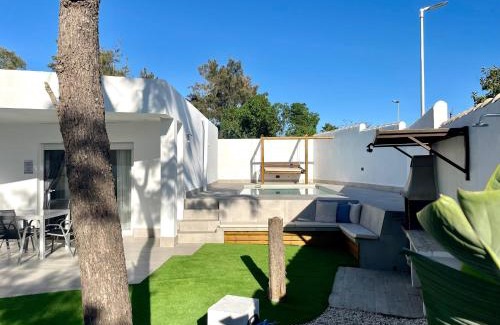 Chiclana de la Frontera Ski Chalet | Enjoy Comfort at Minichalet El Molino 1 - Pet Friendly Retreat
