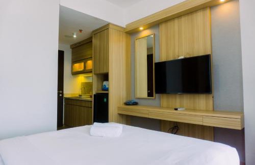 Ciputat Apartment | Minimalist and Warm Studio at Transpark Bintaro Apartment By Travelio