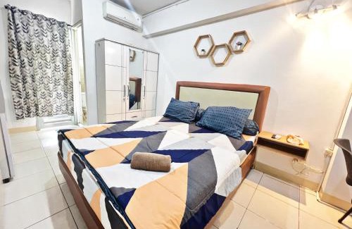 Pluit Apartment | Cozy Studio Retreat Near Baywalk Mall Pluit with Pool