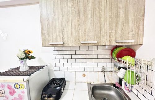 Pluit Apartment | Cozy Studio Retreat Near Baywalk Mall Pluit with Pool