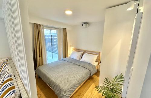 Olymbiaki Akti House | Seaside Apartment with Private Patio and Ocean View