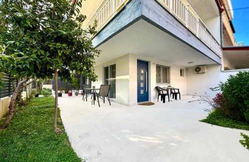 Olymbiaki Akti House | Seaside Apartment with Private Patio and Ocean View