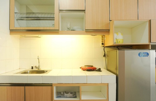 Depok Condo | Modern Park View Studio with Pool Near Shopping Center