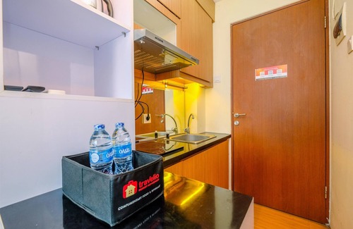 Kayu Putih Apartment | Modern Studio with City Views and Pool at Tifolia Apartment