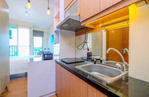 Kayu Putih Apartment | Modern Studio with City Views and Pool at Tifolia Apartment