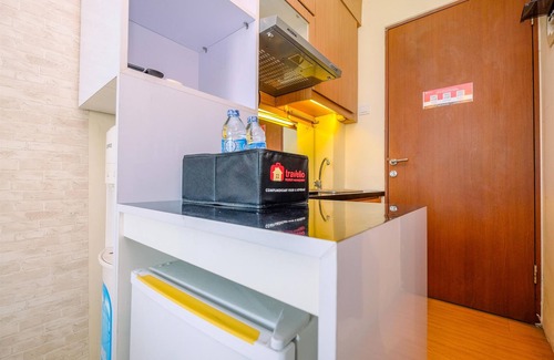 Kayu Putih Apartment | Modern Studio with City Views and Pool at Tifolia Apartment