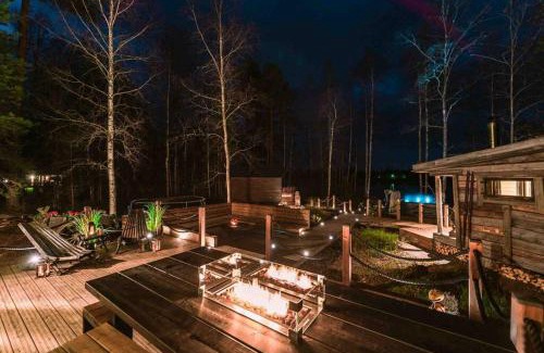 Loppi Ski Chalet | Beautiful Retreat with Hot Tub and Private Beach Access