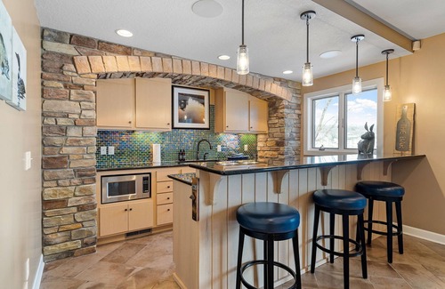 Buffalo House | Maple Lake Chalet | Waterfront Escape with Spa and Pool