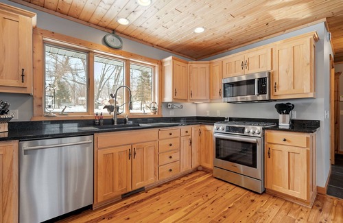 Buffalo House | Maple Lake Chalet | Waterfront Escape with Spa and Pool