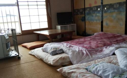 Kunnui House | Pet-Friendly Minshuku Kaikazari Kunnui with Hot Tub Access