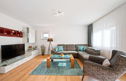 Ludwigshafen Apartment | Family-Friendly Minty Lounge: 4-Star Retreat with Top Reviews
