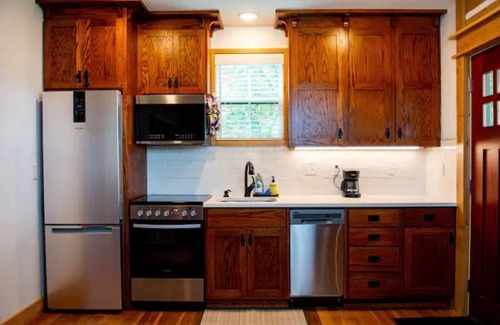 Fayetteville Cabin | Prime Location Near Baum Stadium with Family-Friendly Amenities