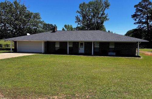 Benton House | Prime Location Near Cypress Lake & Top Local Venues