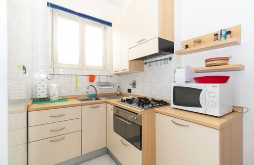 Mirafiori Apartment | Cozy Mirafiori Balcony Apartment with Kitchen & Breakfast