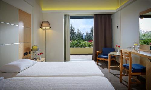 Eretria Hotel | Oceanfront Miramare: 4-Star Hotel with Pool & Restaurant