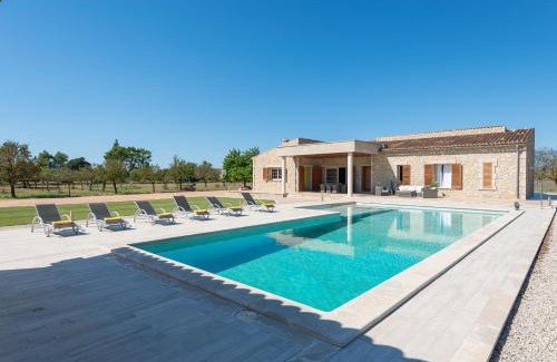 Binissalem Villa | Discover Mireia 2002 by BeBreeze Mallorca: Oceanfront Oasis