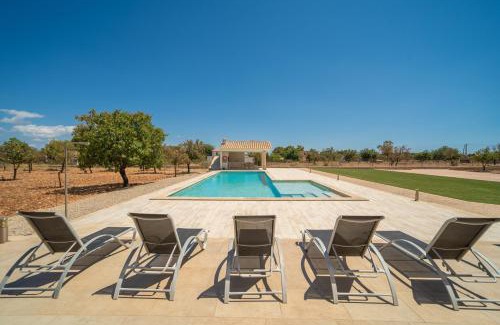 Binissalem Villa | Discover Mireia 2002 by BeBreeze Mallorca: Oceanfront Oasis