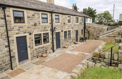 Lumbutts House | Enchanting Mirk Cottage: 4-Star Stay with Family-Friendly Amenities