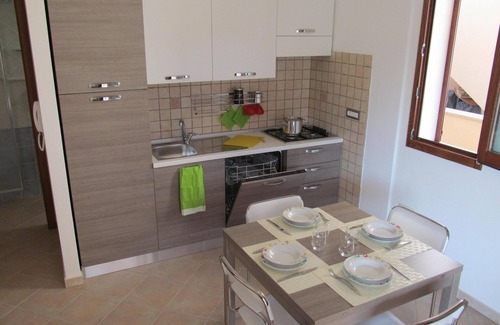 Buggerru Apartment | Delightful Mirto Apartment: Oceanfront Bliss & Pool Access