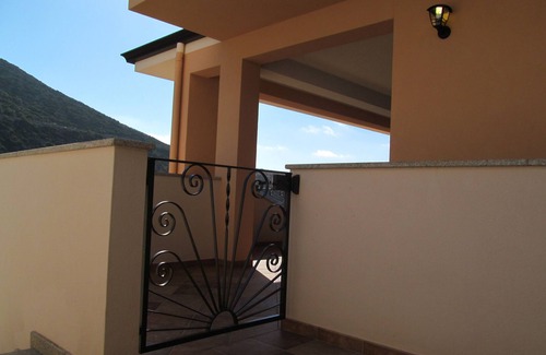 Buggerru Apartment | Delightful Mirto Apartment: Oceanfront Bliss & Pool Access