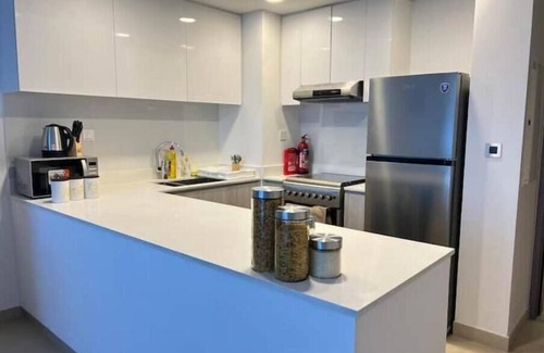 Sharjah Apartment | Urban Oasis in Downtown Aljada: A Family-Friendly Retreat