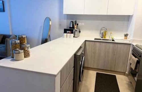 Sharjah Apartment | Urban Oasis in Downtown Aljada: A Family-Friendly Retreat