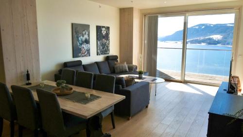 Brumunddal Apartment | Scenic MJOS TOWER Suite with Private Pool & Lake Views