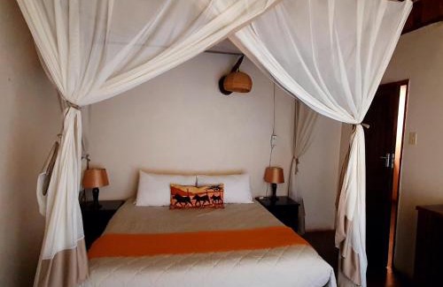 Lobamba Cabin | Discover Mlilwane Game Sanctuary with Pool & Family Amenities