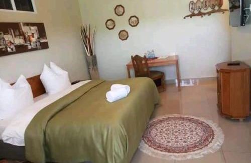 Nanyuki Hotel | Delightful MLIMAVIEW GARDENS with Restaurant & Family Fun