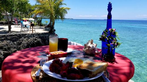 Moalboal Resort | Beachfront Bliss at Moalboal T Breeze Coastal Resort