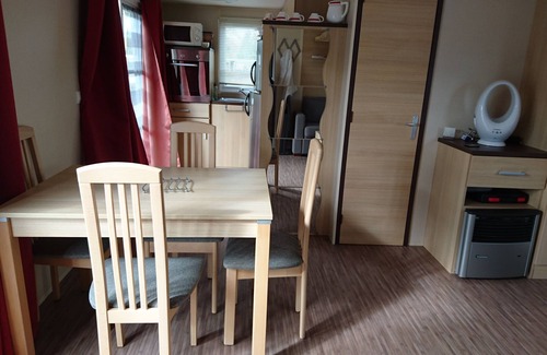 Dinard House | Inviting Mobile Home with Pool & Tennis Court Open Year-Round