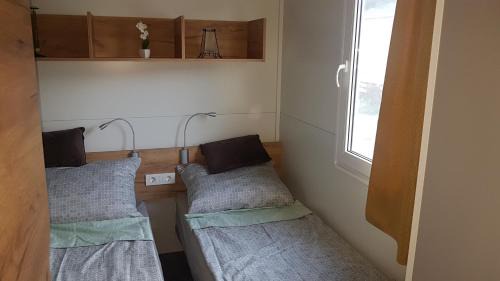Susica Resort | Pet-Friendly Mobile Home with Ocean Views in Murter