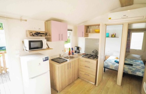 Gralaoni-Pralesi-Cisano House | Mobilehome with air conditioning, terrace and pool