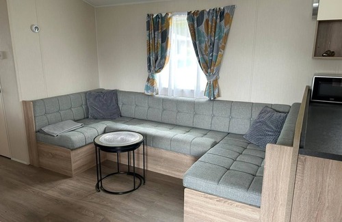 Midlum Apartment | Cozy Mobilheim for 4 Guests with Oceanfront Views