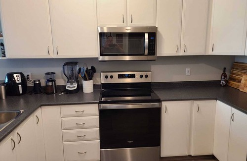 Downtown West End Condo | Stylish 1BR Condo by Bow River with Gym & Pool Access