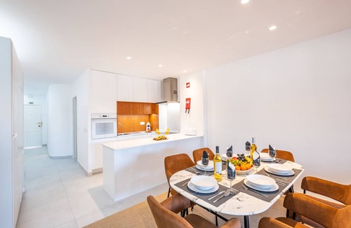 Areias de Sao Joao Apartment | Modern Apartment with Pool, Ocean Views & Central Location