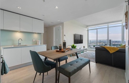 Victoria Park Condo | Modern 1BR with Spectacular Stampede Views & Great Amenities