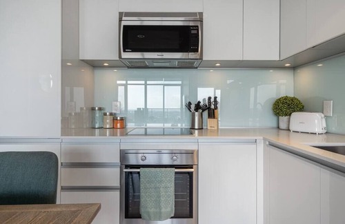 Victoria Park Condo | Modern 1BR with Spectacular Stampede Views & Great Amenities