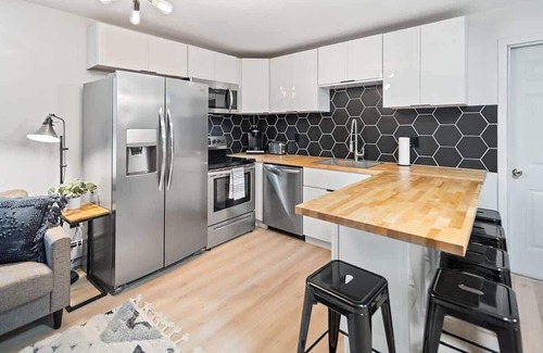 South Hill Apartment | Modern 2 Bedroom Retreat with Outdoor Space for Families