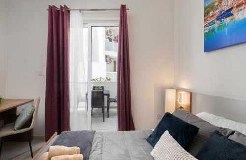 Gzira Apartment | Modern 2BD Apartment with Maltese Balcony & Back Yard - Close to St Julian's & St Georges Bay & Sliema Promenade