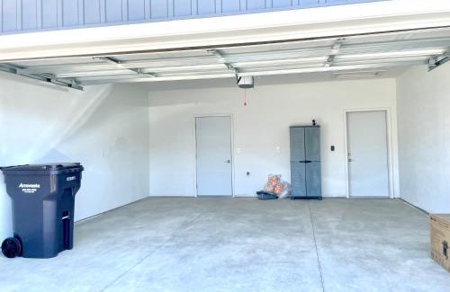 Grandville House | Guest Rated 10/10: Modern 2BR Condo with Garage & Patio