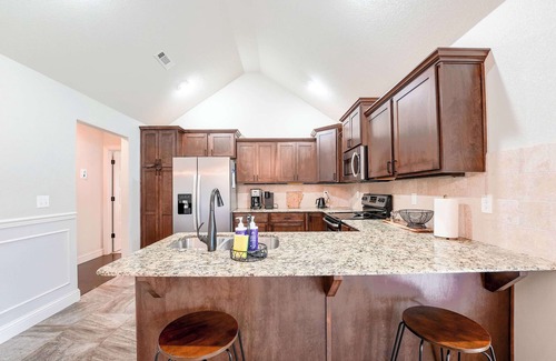 Cave Springs House | Modern 3BR Retreat EV Charger Fenced Yard by XNA