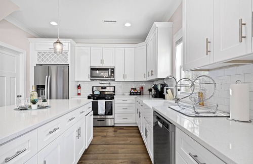 Sharonbrook House | Modern 4 BR/2.5 Bath Retreat Steps from Light Rail