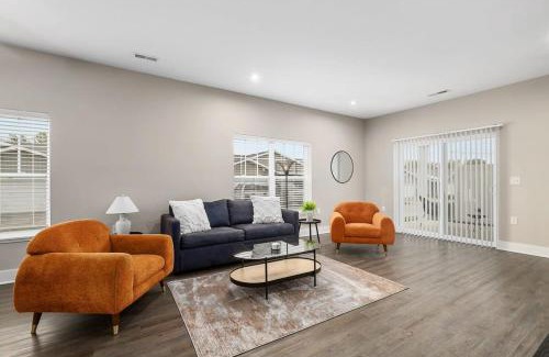 Grandville Apartment | Modern 4BR Condo with Garage, Patio & Family-Friendly Vibes